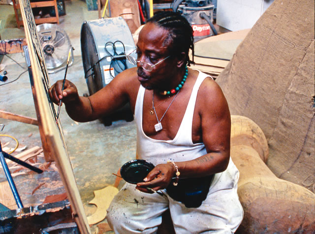 Twins Seven-Seven in his studio